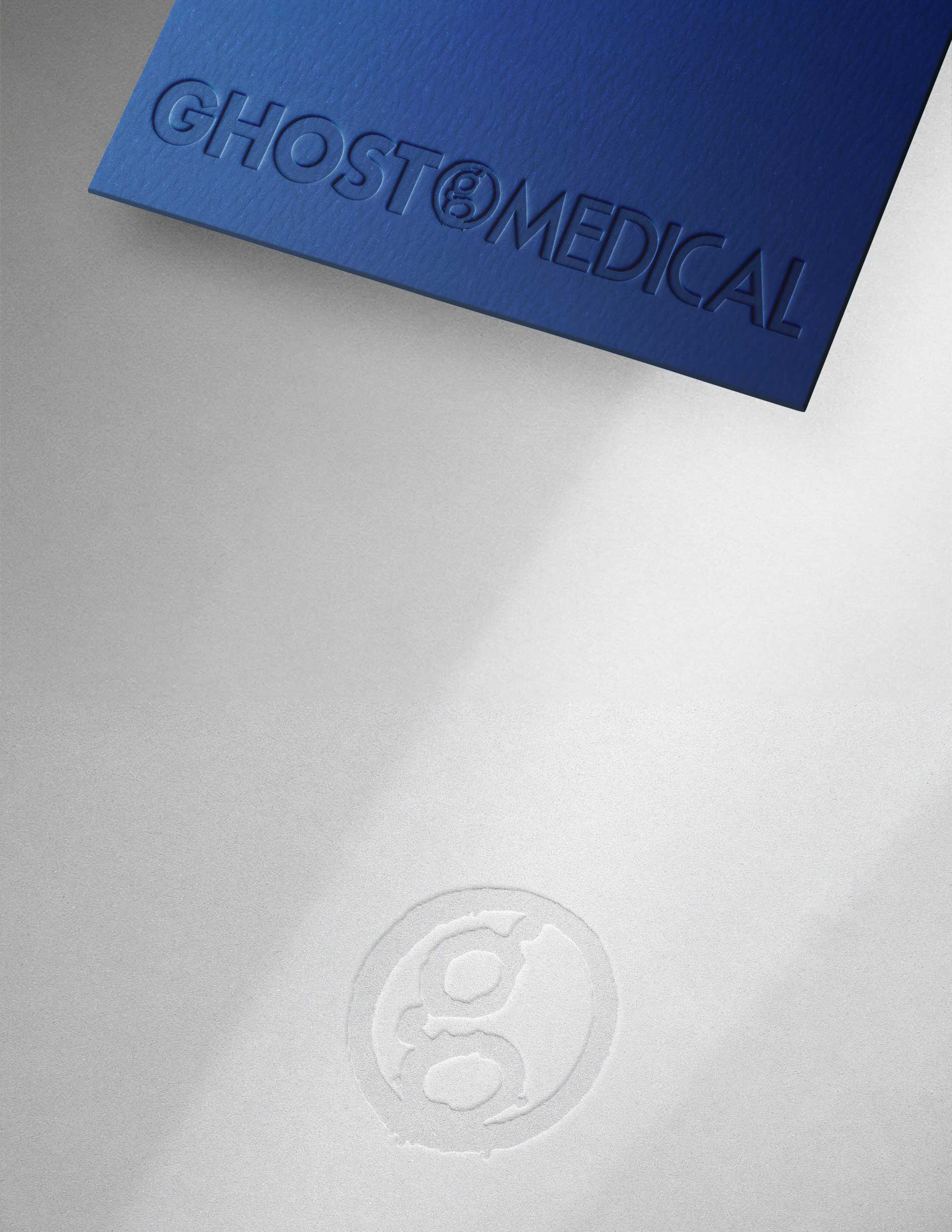 Ghost Medical logo stamped into paper